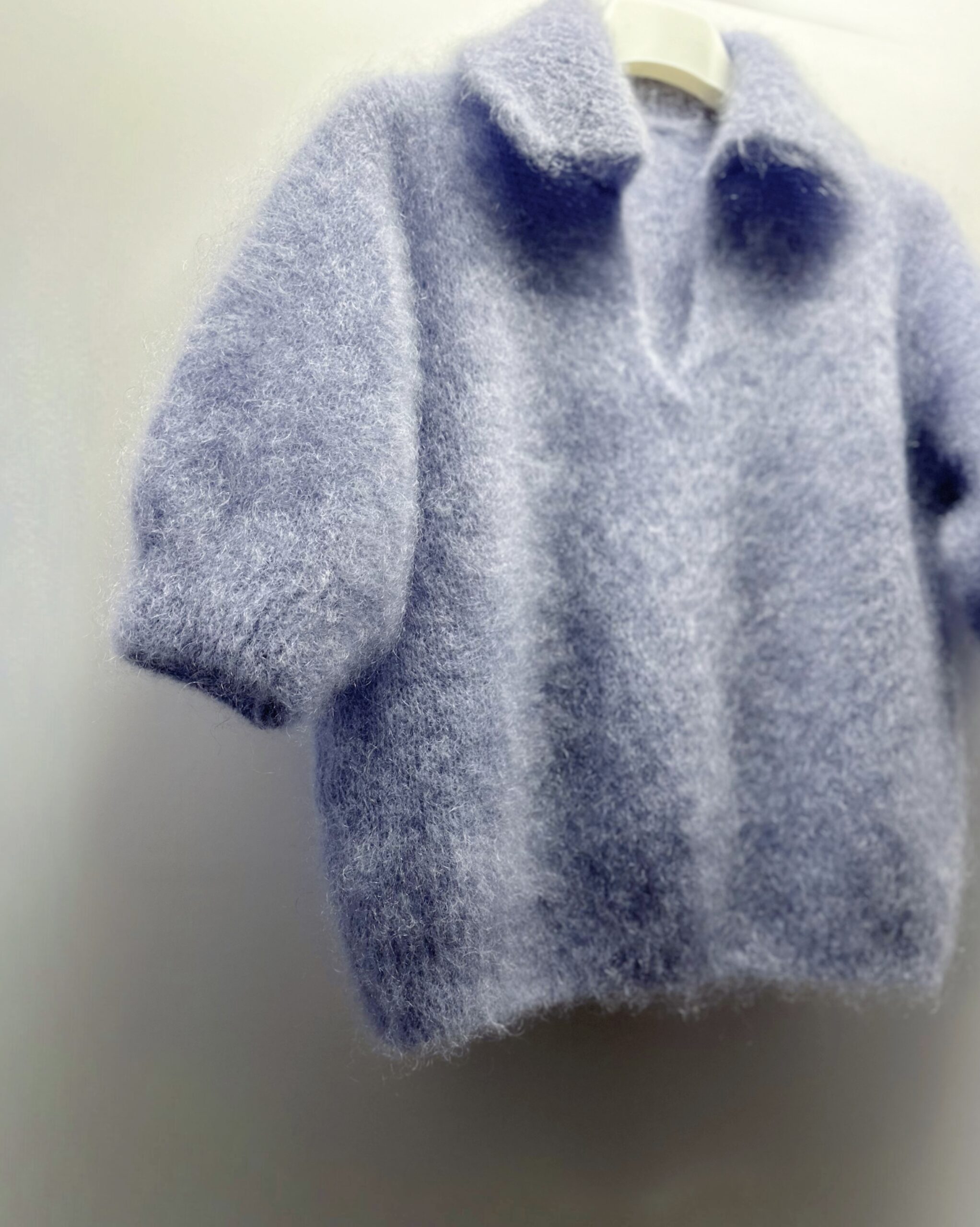 INCREDIBLY SOFT AND WARM LIGHT BLUE CARDIGAN. NATURAL WOOL 81% KID MOHAIR