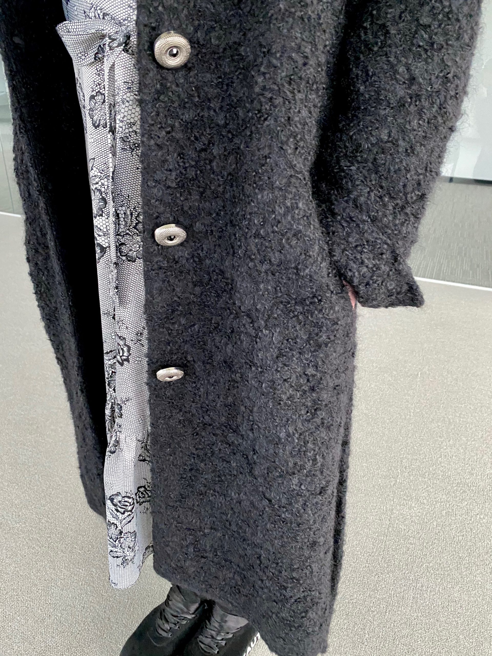 Fluffy black wool coat with silver buttons