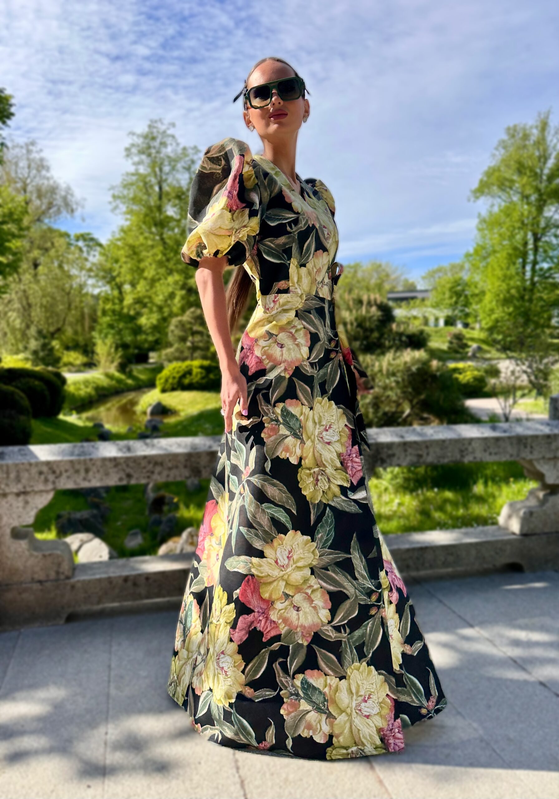 Luxurious peonies on a summer evening, a long cotton dress