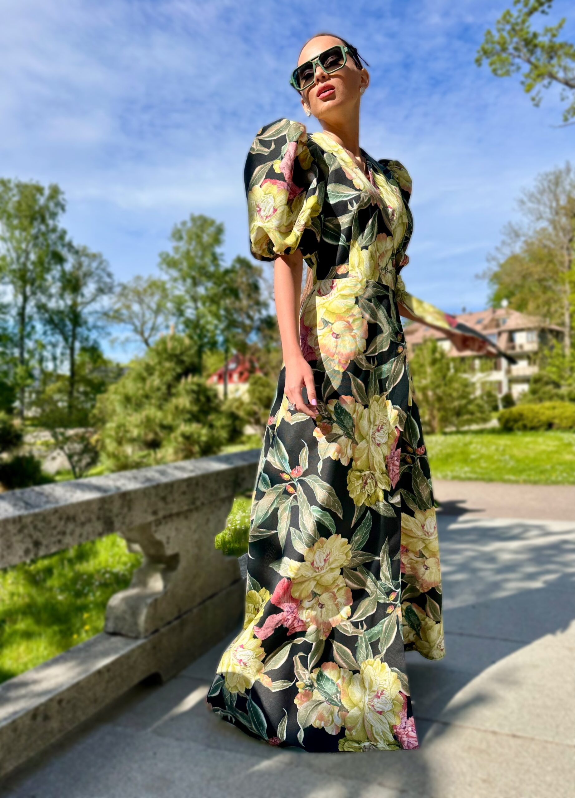 Luxurious peonies on a summer evening, a long cotton dress