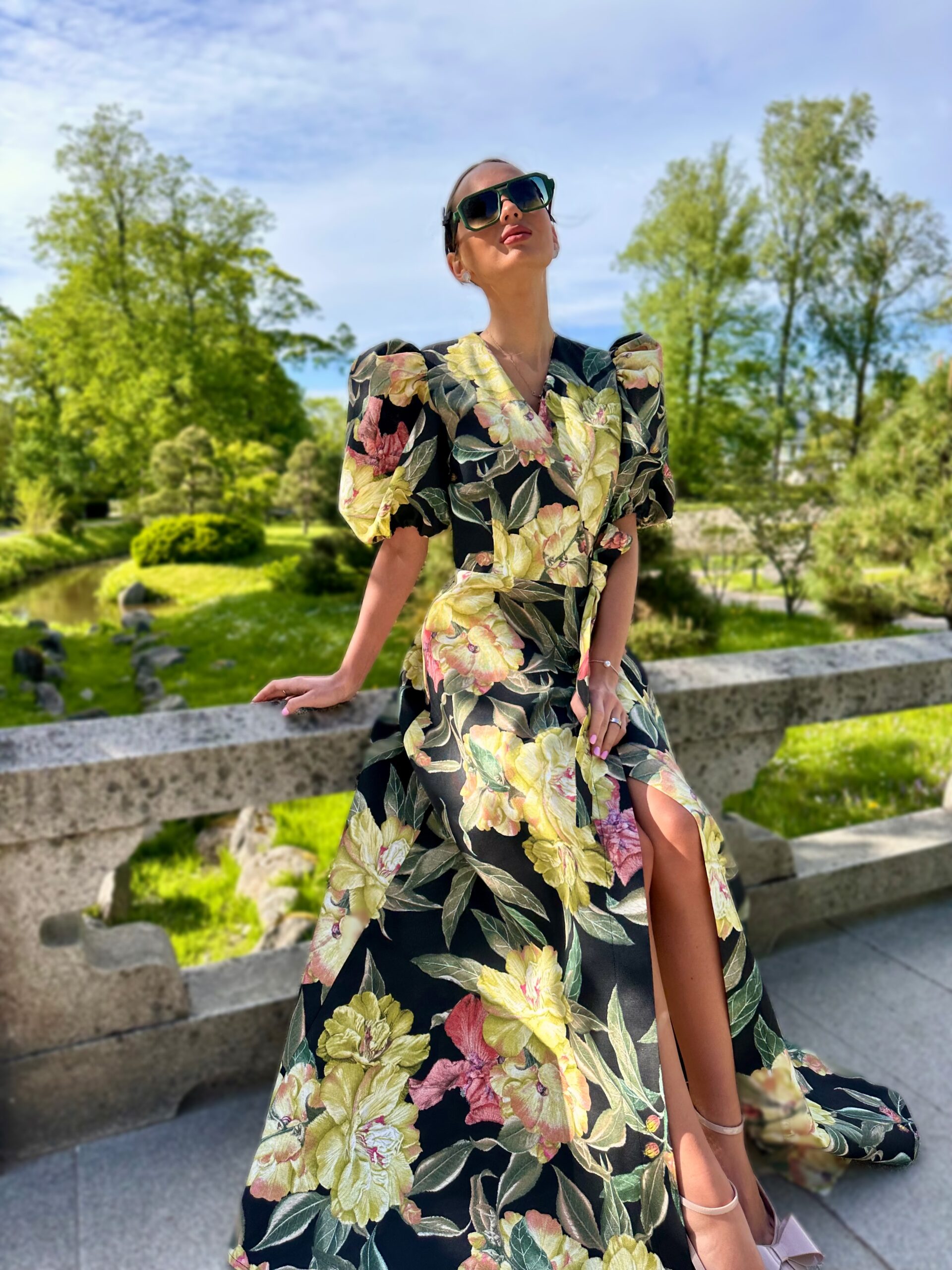 Luxurious peonies on a summer evening, a long cotton dress